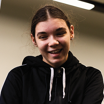 A young student smiling